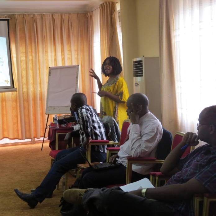 Cameroonian lawyer and Artwatch Africa project facilitator, Mabelle Nforchu, teaching Ugandan artists about their rights at the workshop.